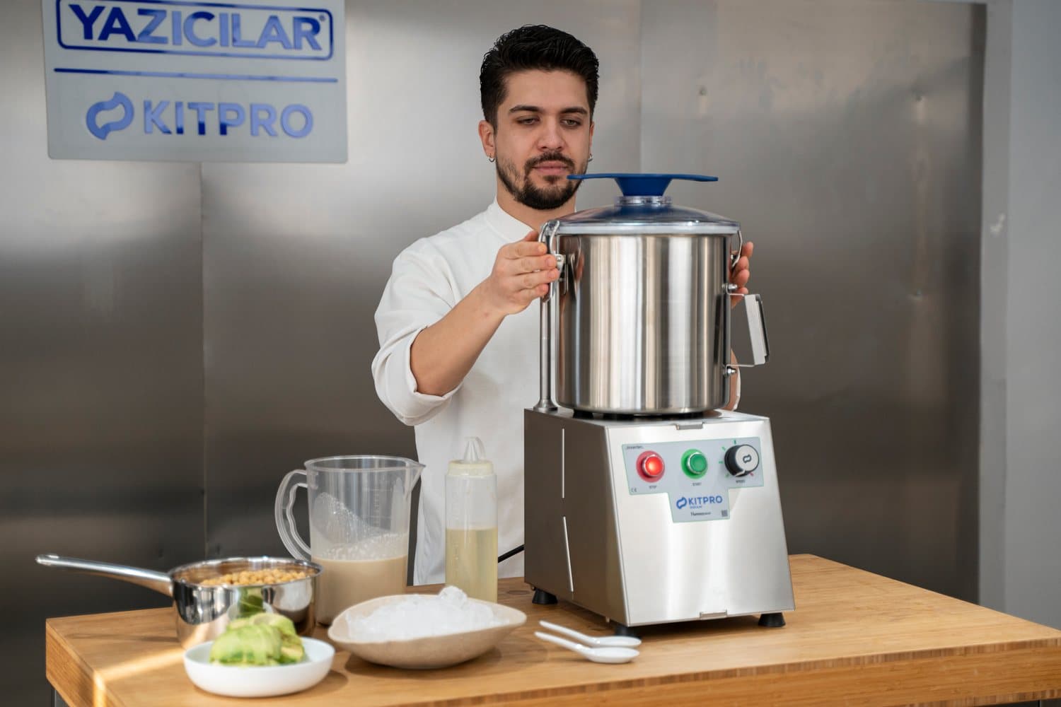 HummusMaster cutter mixer producing fresh hummus